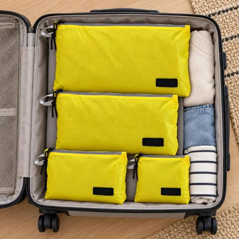 Flexible Travel Packing Bags — 4-Piece Waterproof Nylon Organizer Set