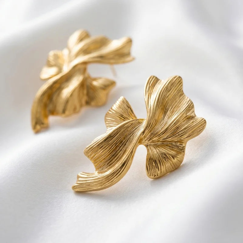 Obega Gold Abstract Wave Earrings — Textured Leaf Statement Studs