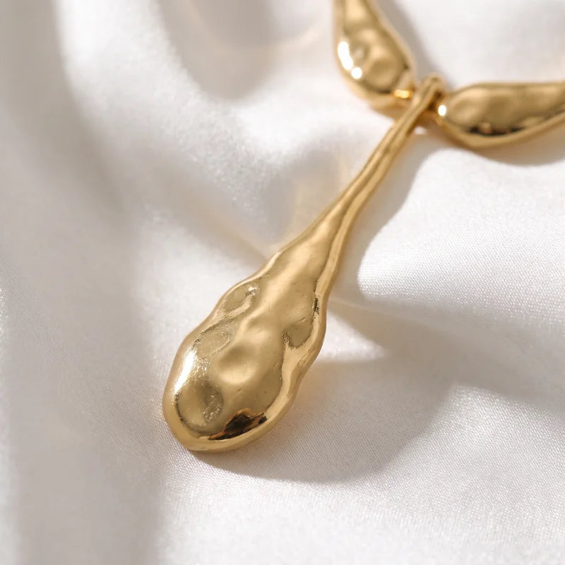 Obega Wavy Gold Metal Choker — Irregular Teardrop Pendant Necklace
