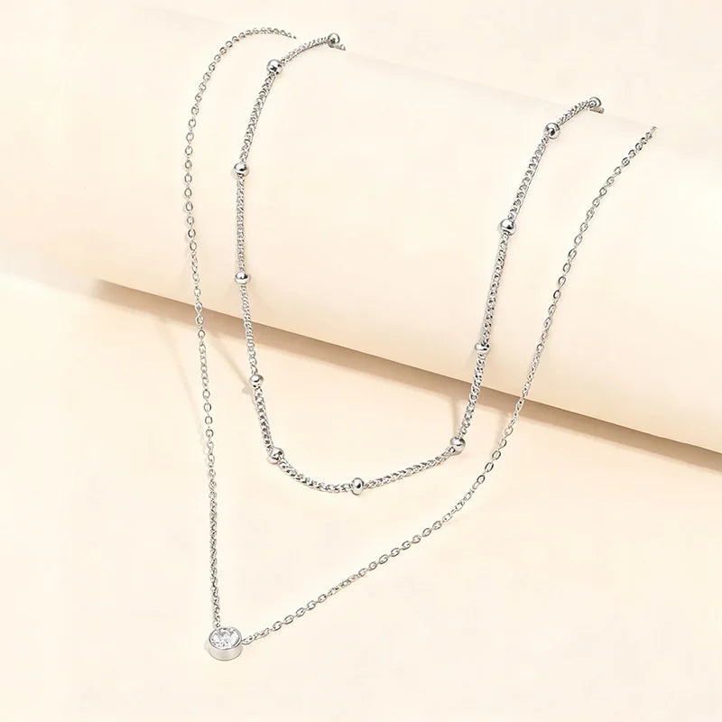 Double-Layer Stainless Steel Necklace — Elegant CZ Pendant with Beaded Detail