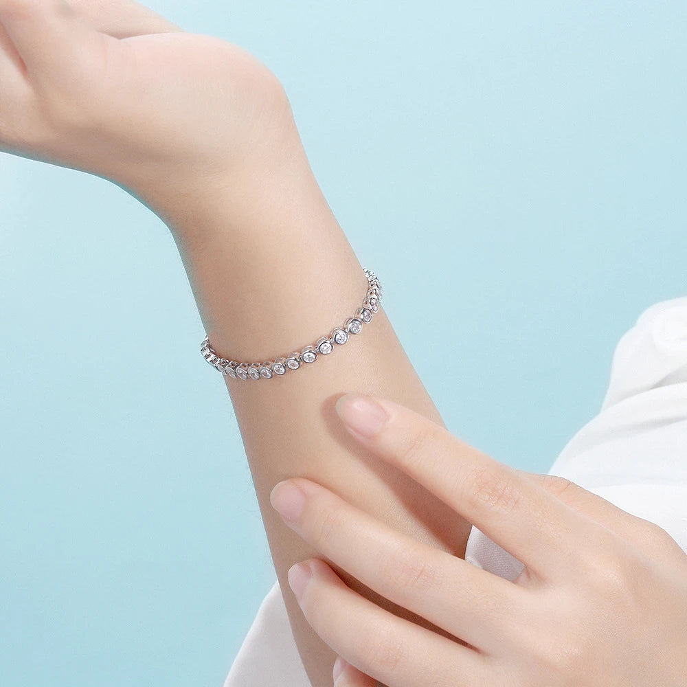 knobspin Moissanite Tennis Bracelet — D VVS1 Round Cut Sterling Silver