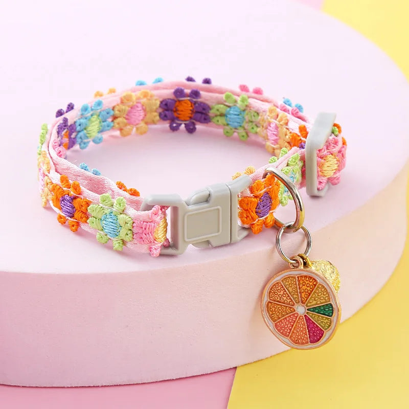Adjustable Pet Collar with Bell — Colorful Paw Print Pattern for Cats and Small Dogs