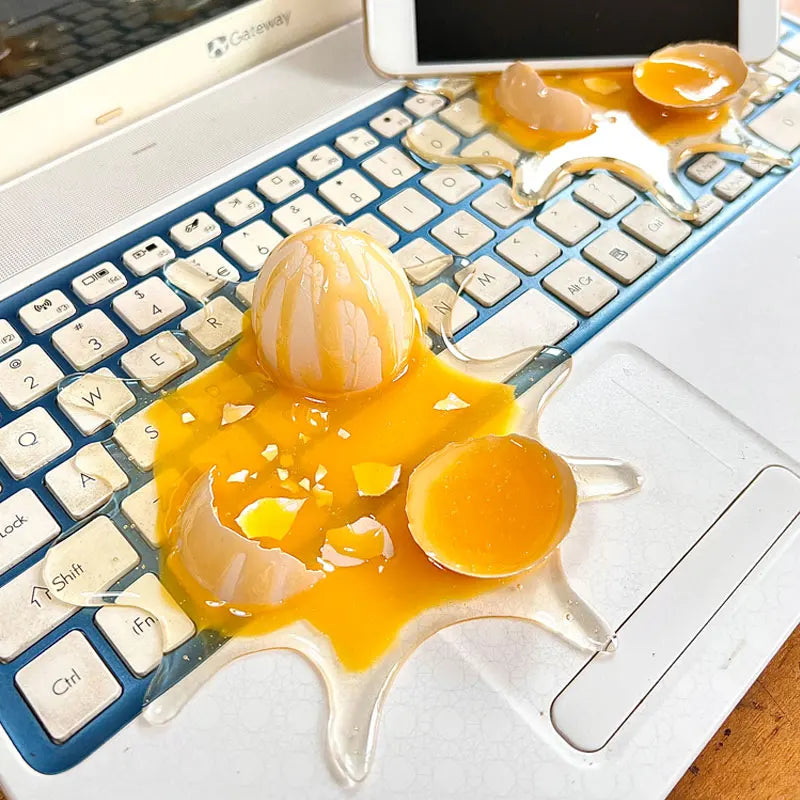 MYGVN Realistic Broken Egg Prank Toy — Funny Mobile Phone Holder & Gag Gift