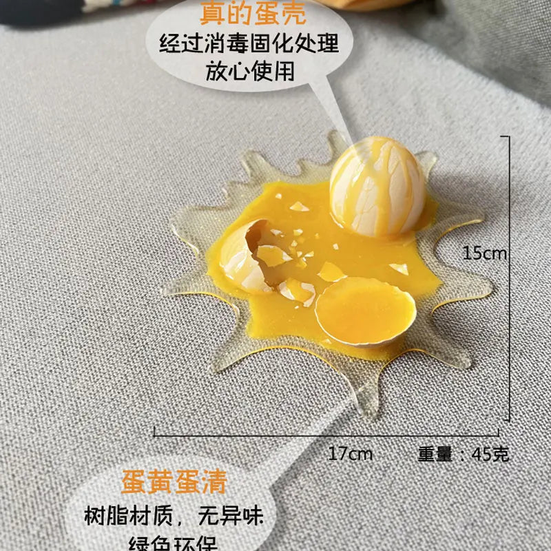 MYGVN Realistic Broken Egg Prank Toy — Funny Mobile Phone Holder & Gag Gift