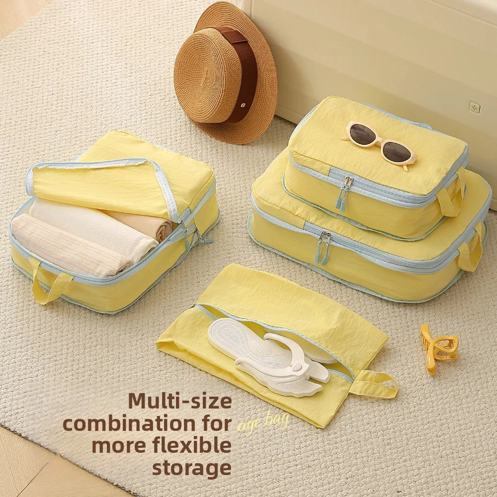 Four-Piece Packing Cube Set — Space-Saving Luggage Organizers with Shoe Bag